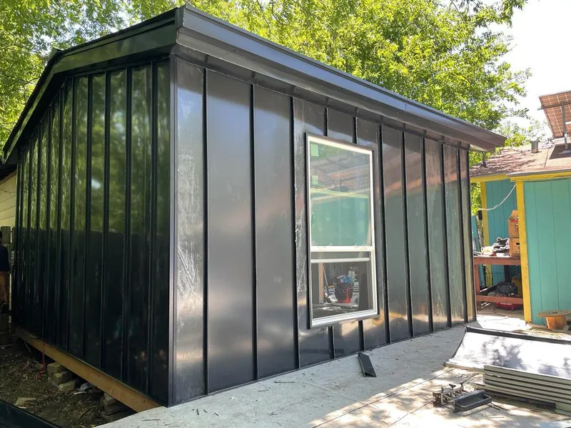 Black standing seam metal wall panels for Metal Roof Installation in South Abington