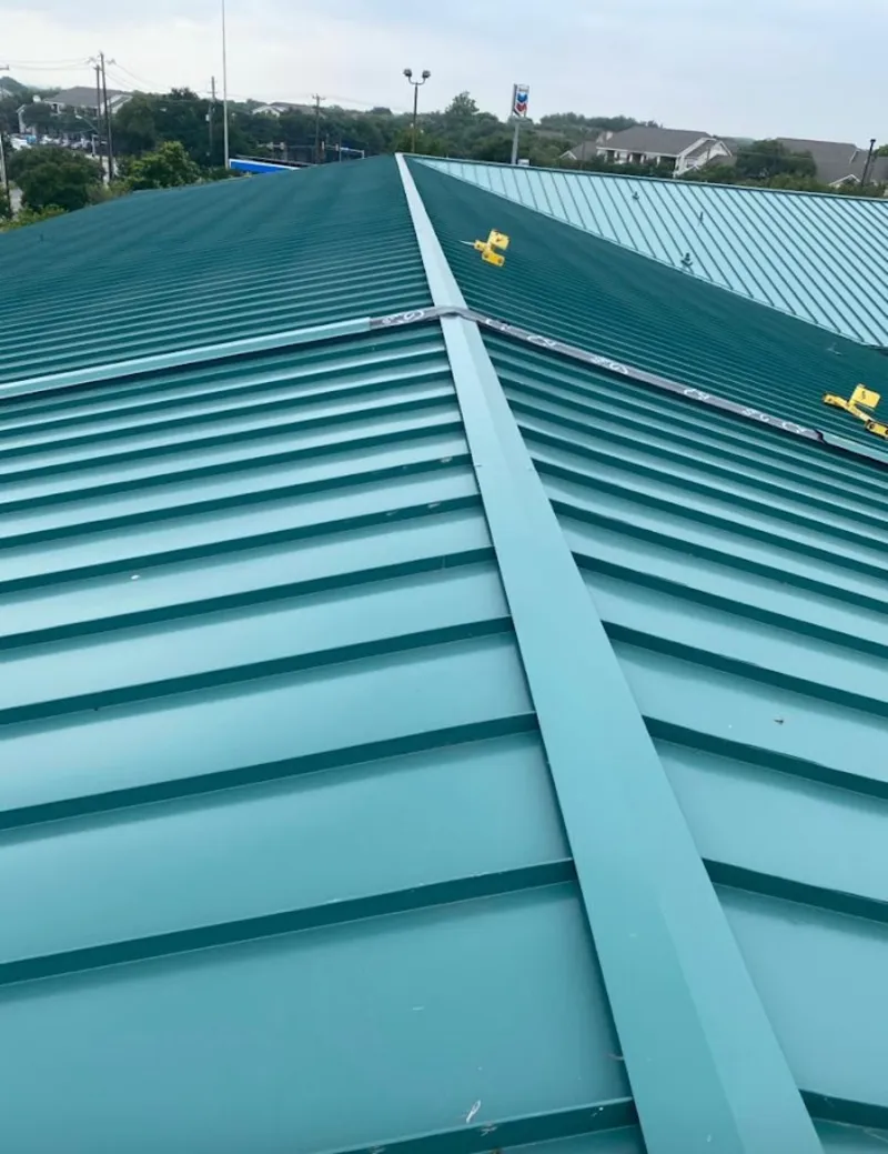 Green commercial metal roof ridge and valley for Metal Roof Repair in South Abington